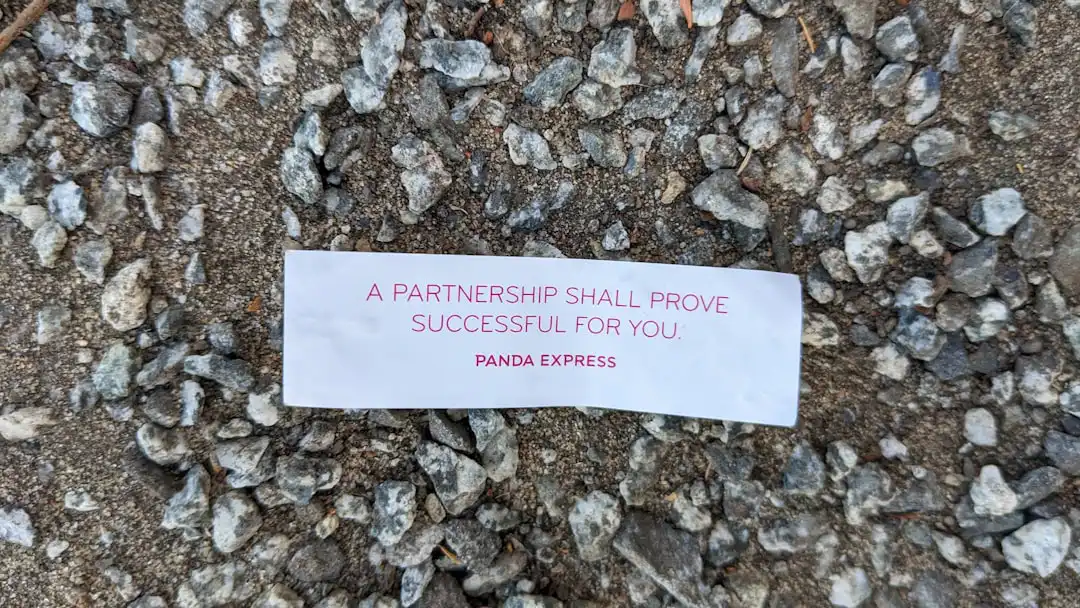 A piece of paper that is laying on the ground