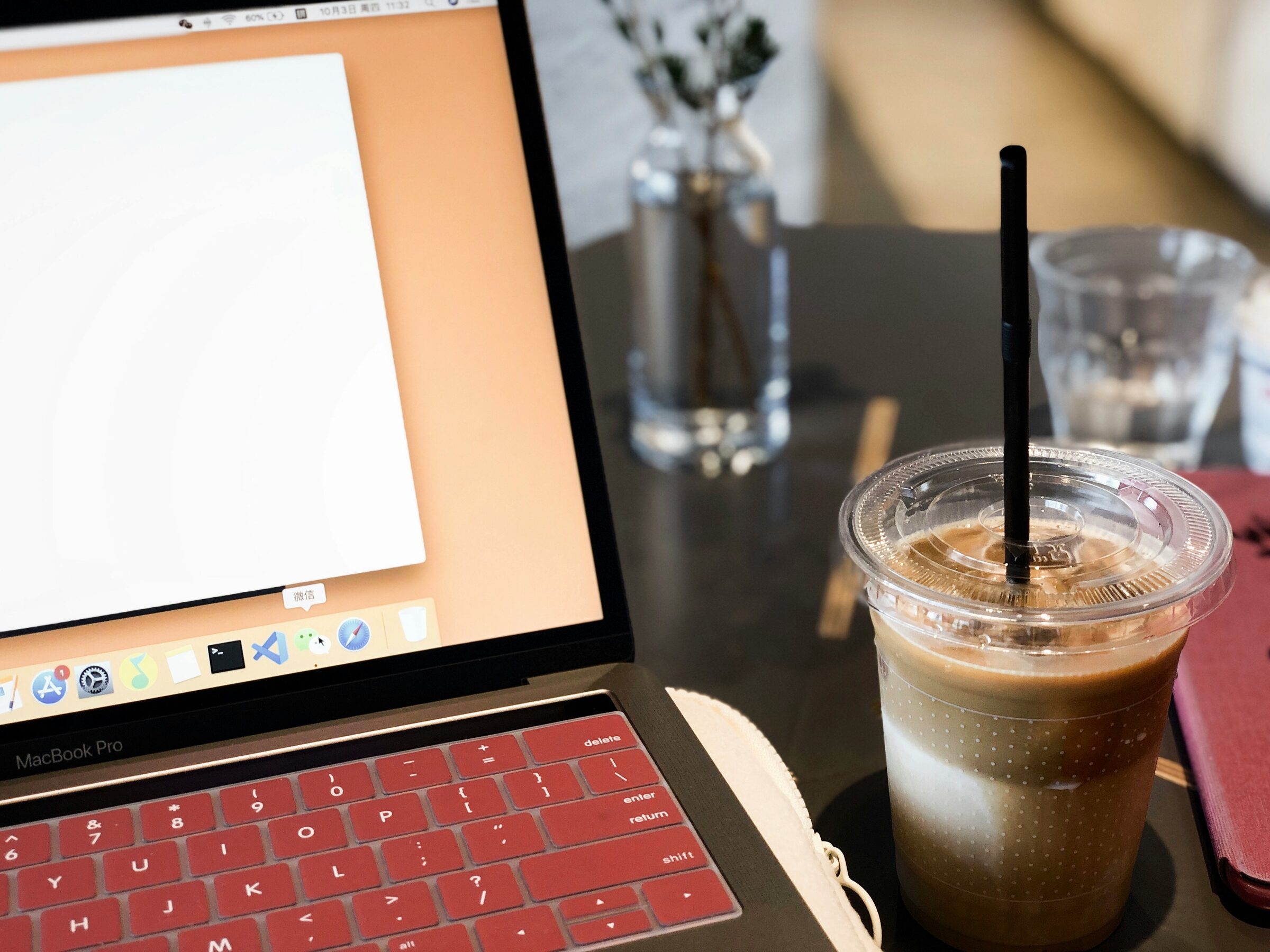 Laptop with coffee showing a blogging platform interface for content creation