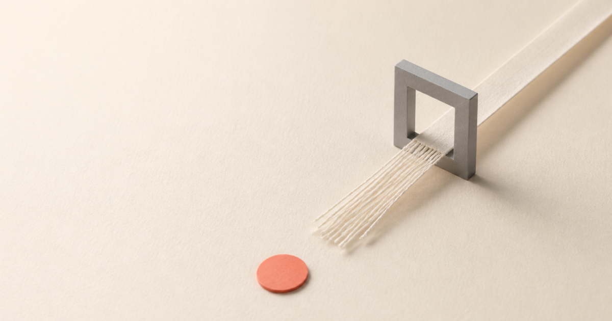 Link in bio failure concept: a smooth paper ribbon passes through a grey gate and emerges frayed, never reaching the coral disc beyond