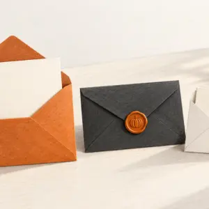Three paper envelopes and letters arranged for a seasonal email sequence.