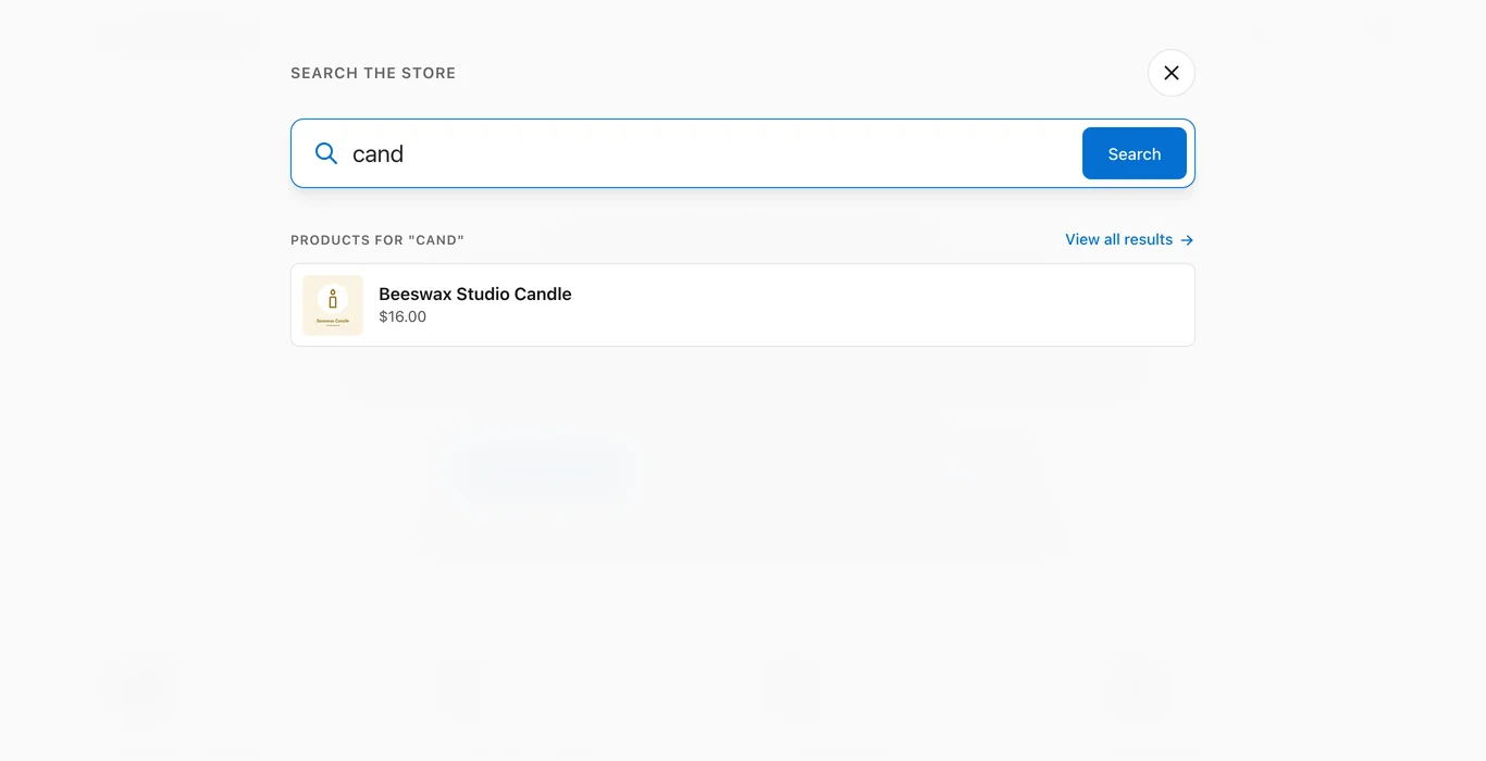 Full-screen product search overlay on the Stackless theme showing a live result for the query cand